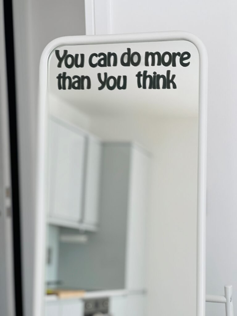 pexels-photo-18202302-18202302 Reflective motivational quote in a modern kitchen setting.